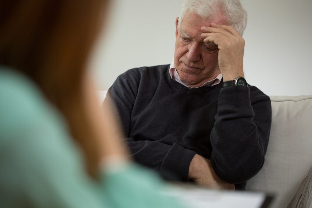 man in therapy dealing with toxic masculinity